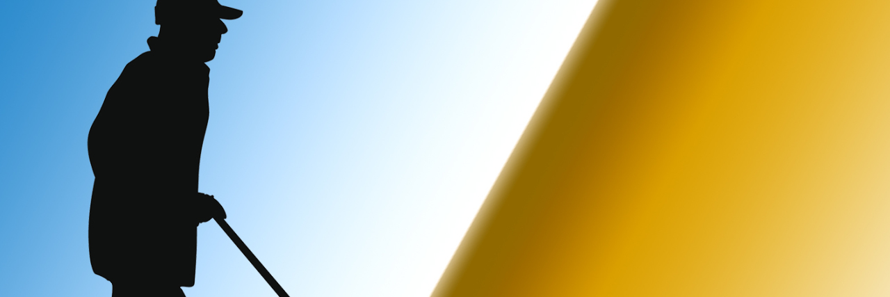 I Am What Disability Looks Like Silhouette of a man walking with a cane.