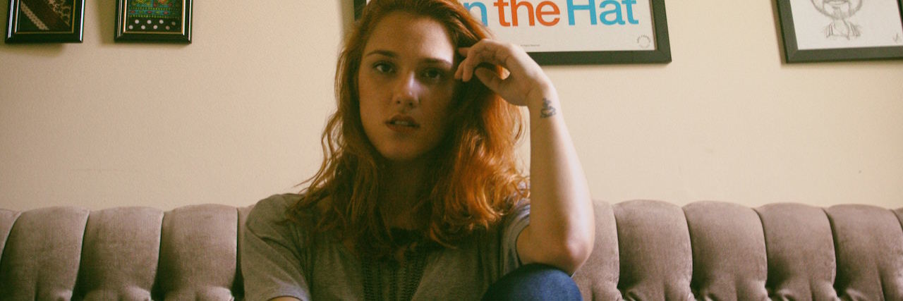 'People With Borderline Personality Disorder Are Difficult' A woman sitting on a couch