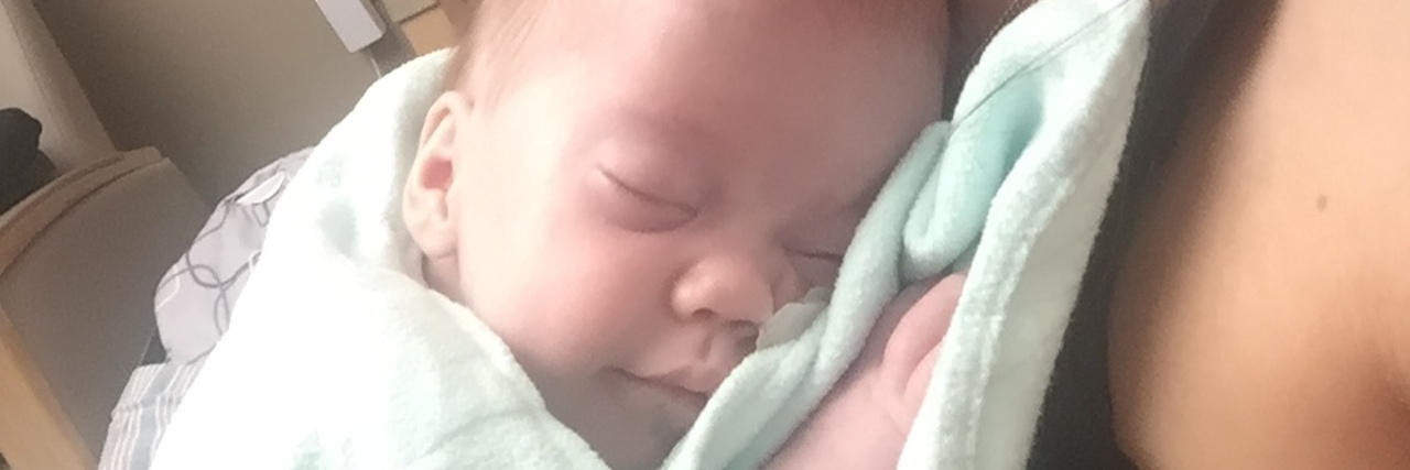 Letter to Moms Who Have Sick Babies in the Hospital Mother holding a premature baby at the hospital