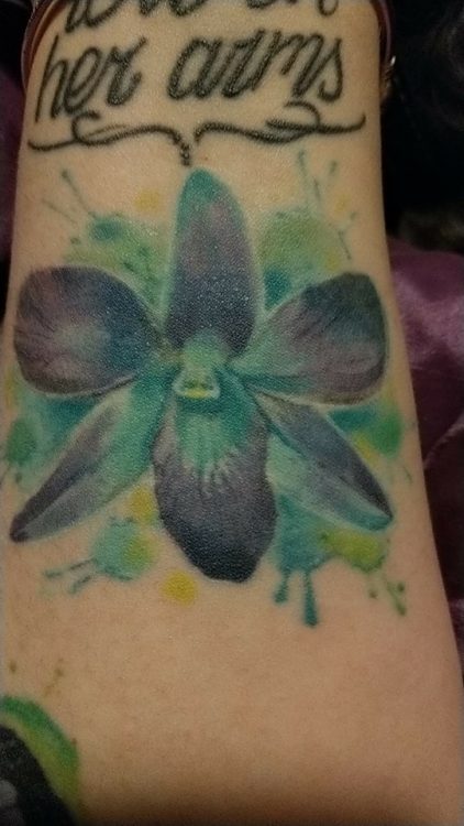 orchid tattoo on arm