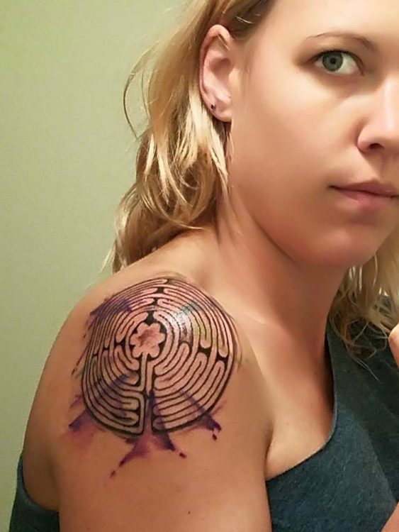 maze tattoo on woman's shoulder