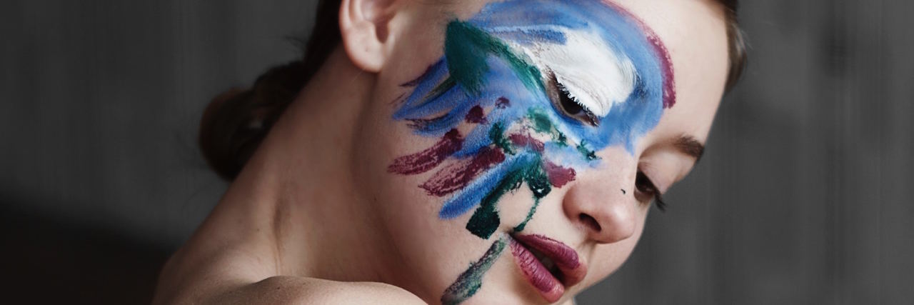 woman with paint on face