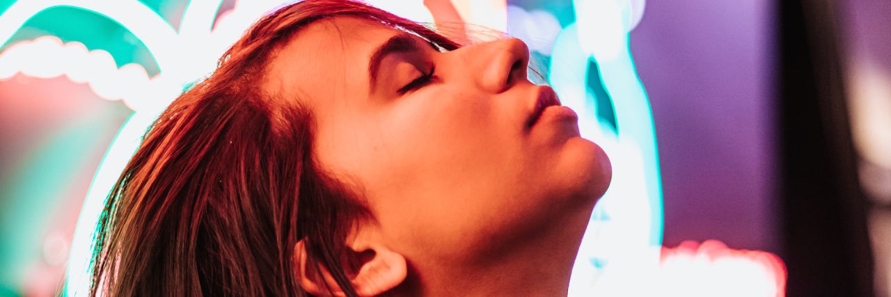 Why You Can't Tell a Trauma Survivor to Just 'Push Through It' woman looking up