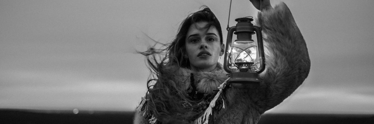 A Letter to People Still Healing in Depression Recovery woman with lantern