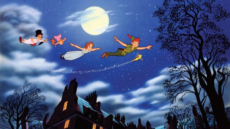 Peter Pan, Wendy and two other children flying in the sky at night
