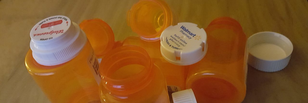 A picture of medication bottles on a table.