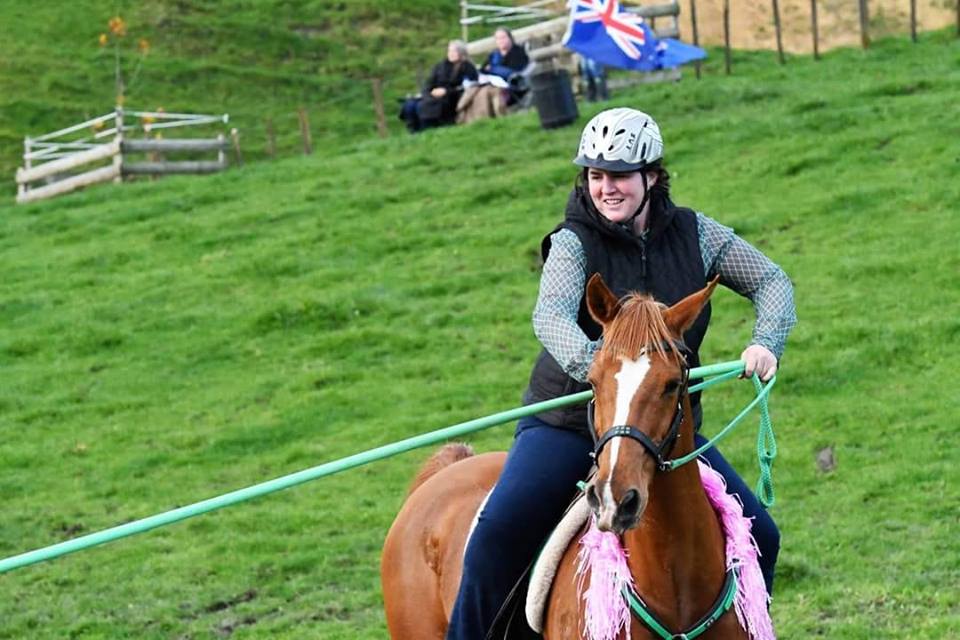 woman riding a horse