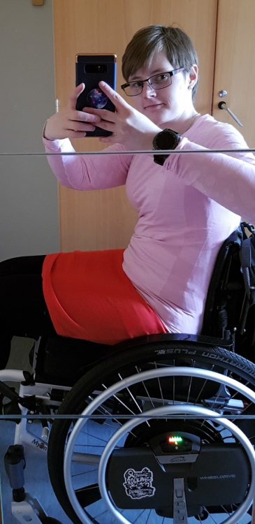 woman taking selfie in wheelchair