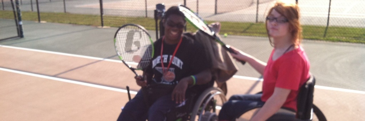 Dating and Friendship With Cerebral Palsy Alyssa playing tennis with her friend.