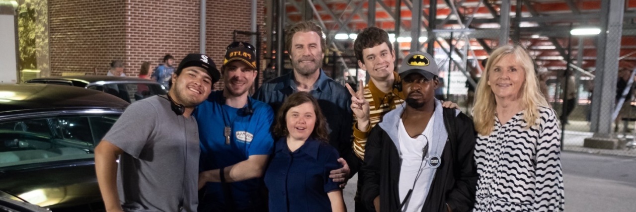 John Travolta Says My Daughter With Down Syndrome Is Great at Her Job Marissa with movie crew, including John Travolta