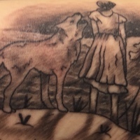 tattoo of woman and wolf with tom walker lyrics from Leave a Light On