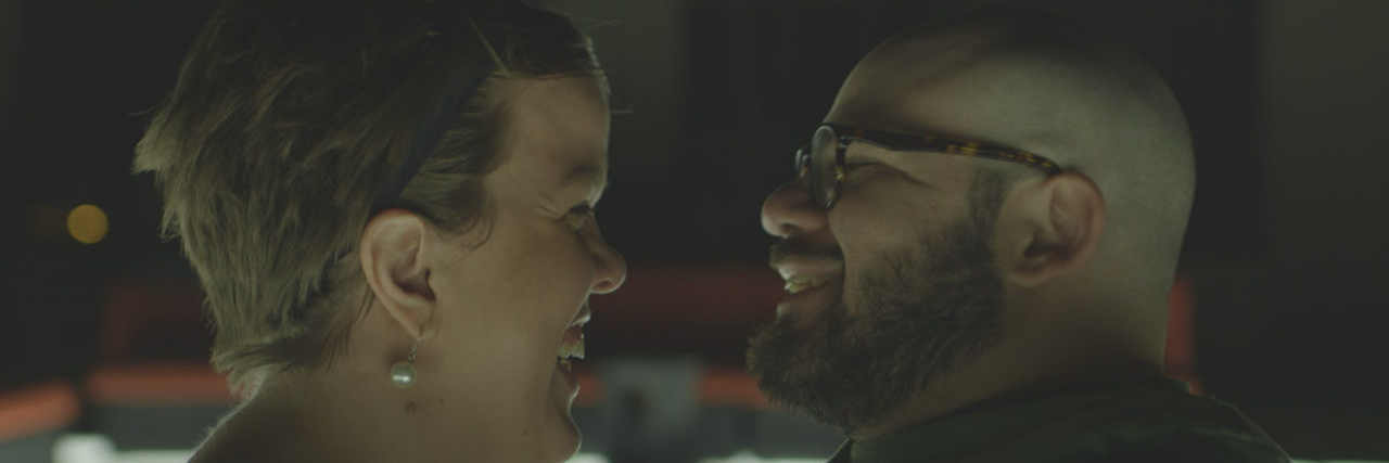 'Far From the Tree' Examines Parenting Children With Disabilities Leah Smith and her husband holding hands, smiling and face-to-face