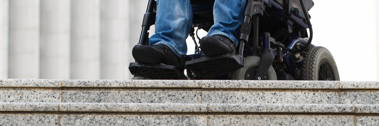 Dealing With Inaccessibility as a Wheelchair User Wheelchair user in front of staircase.