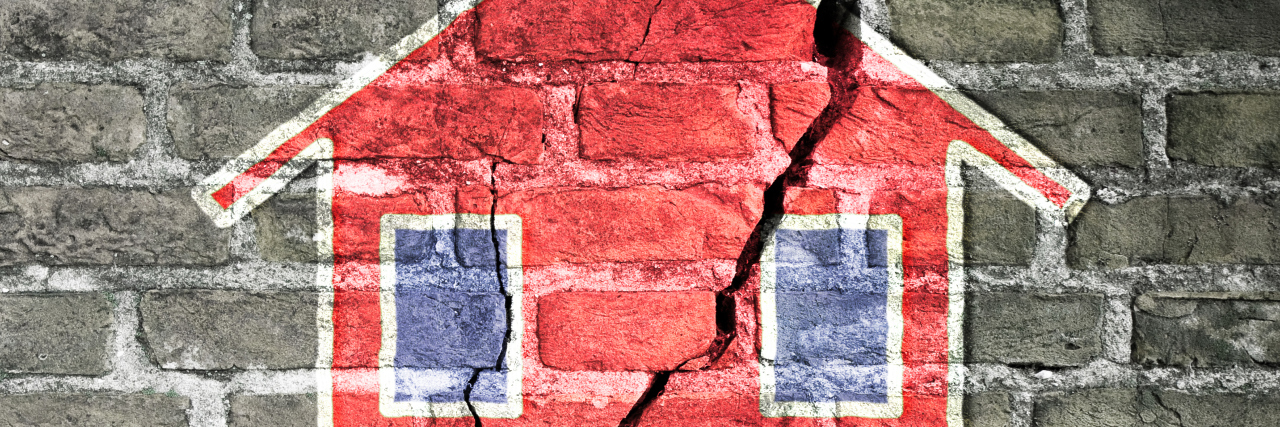 Explaining Invisible Disability Cracked brick wall with a red house drawn on it.