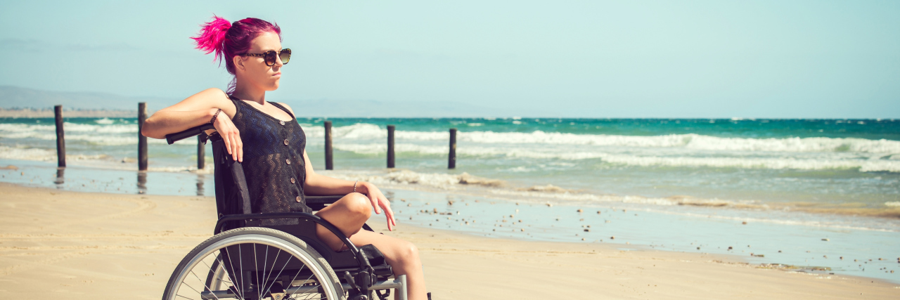 Disabled woman at the beach