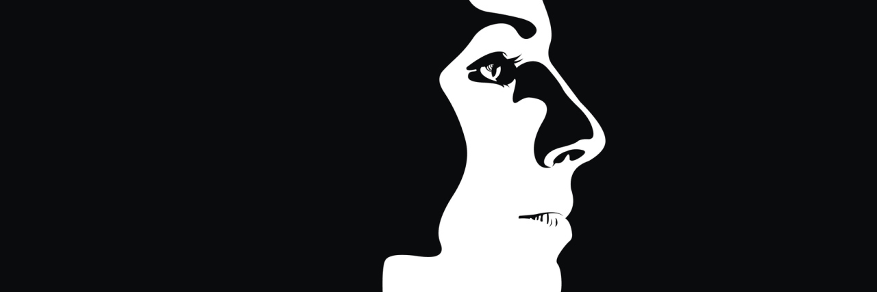 Life With Autonomic Dysfunction: What Invisible Illness 'Looks' Like profile view of a woman surrounded by shadow