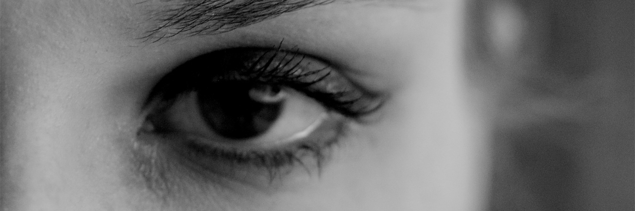 The Conversation I Remind Myself of When My Illness Makes Me Upset A picture of a woman with a tear falling down her cheek.