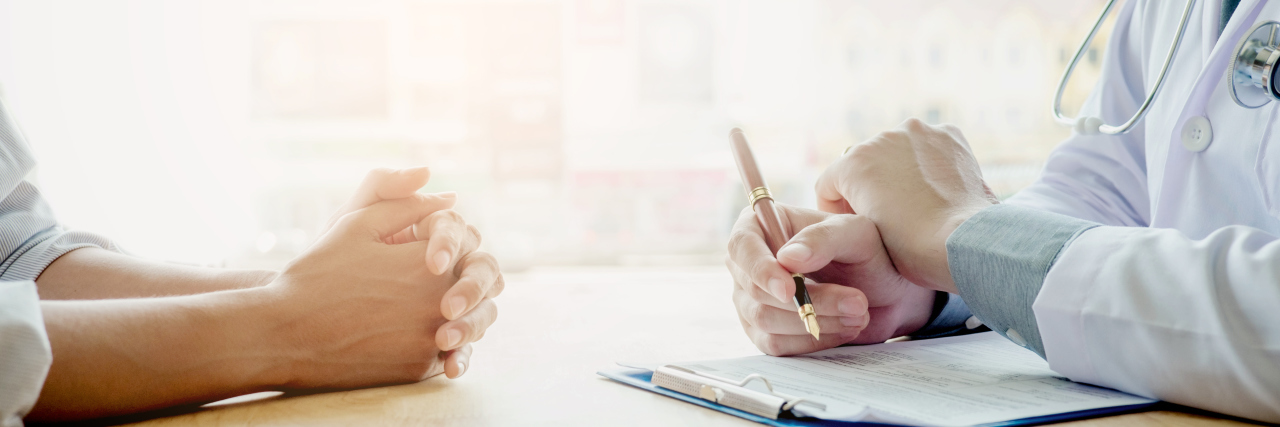 Tips for Improving Patient-Provider Communication Doctors and patients sit and talk. At the table near the window in the hospital.