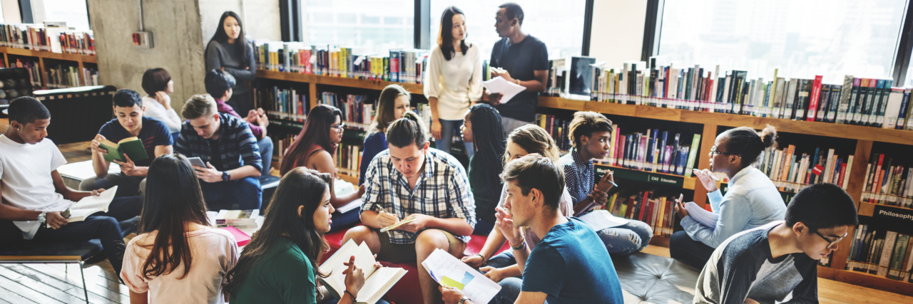 University students in library.