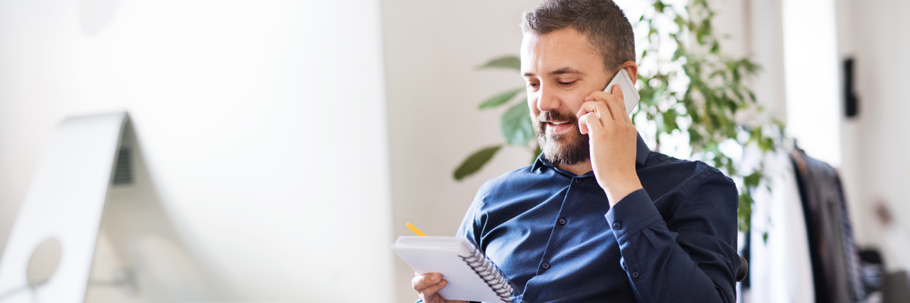 How Having a Stutter Made Me a Better Communicator Man on phone.