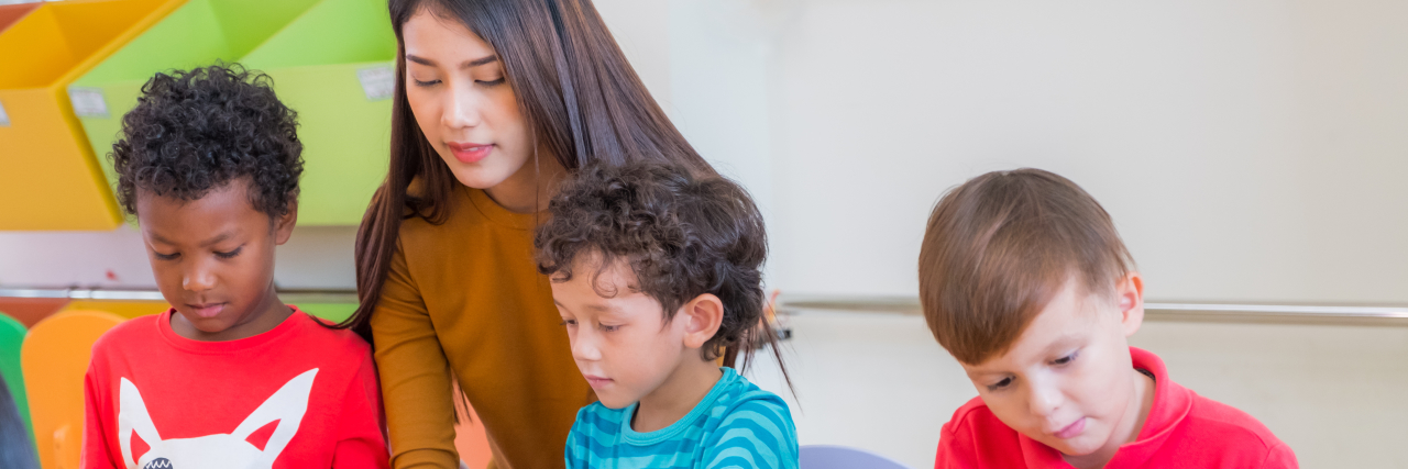 What I Want Teachers to Know as an Adult With Learning Disabilities Teacher with students in classroom.