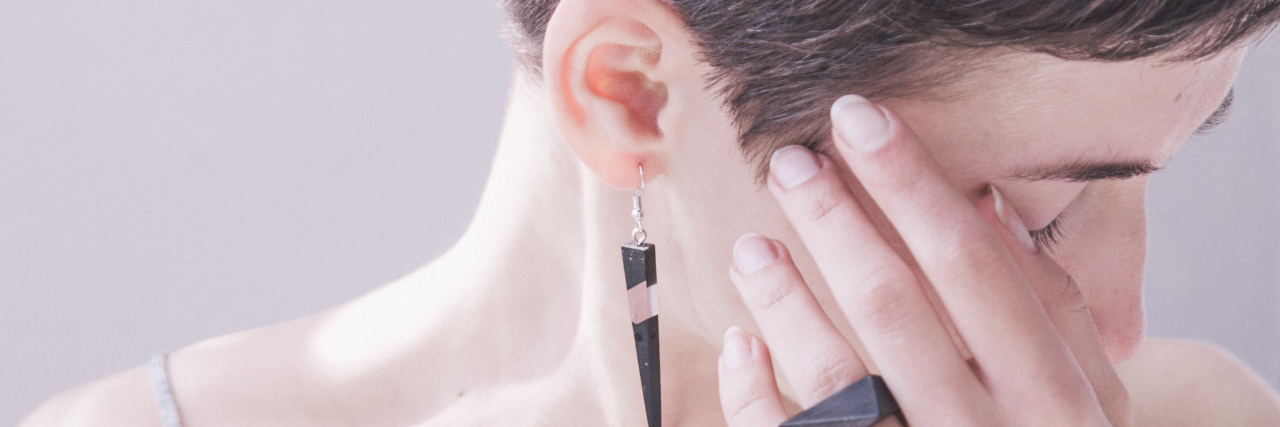 To Those With Chronic Illness: It's OK for Your Body Not to Be OK portrait of a woman with short brown hair in a white top