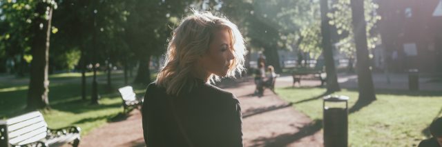 Portrait of a woman walking in the park