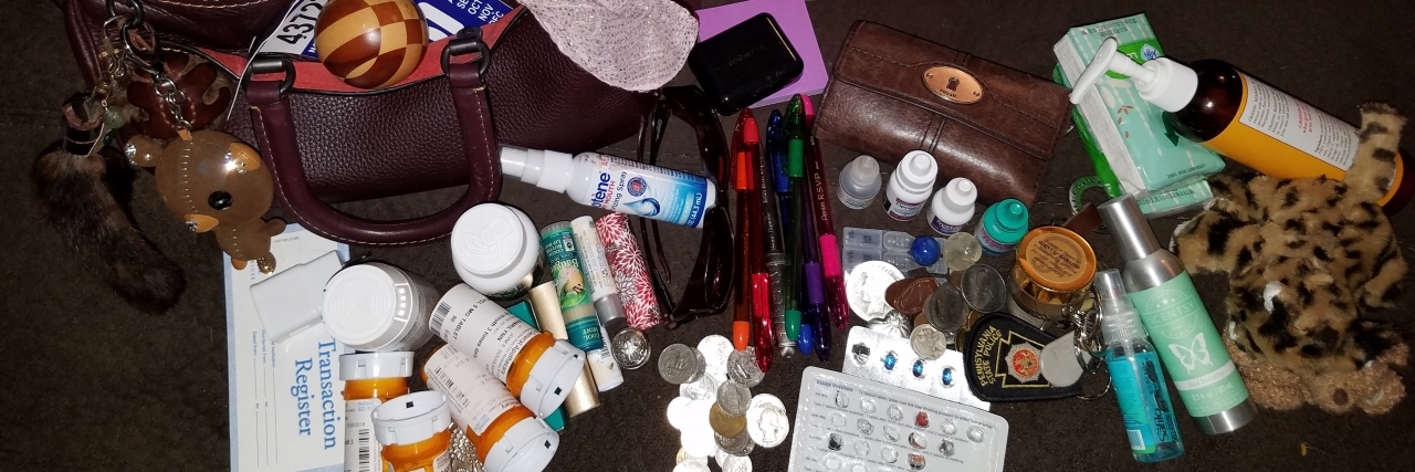 What People With Chronic Illness Carry in Their Purse contents of the author's purse