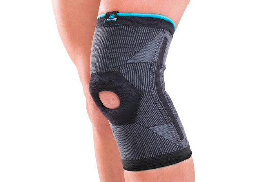 Black elastic knee sleeve for compression.