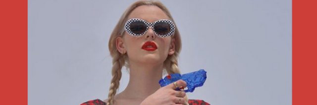 model holding a water gun