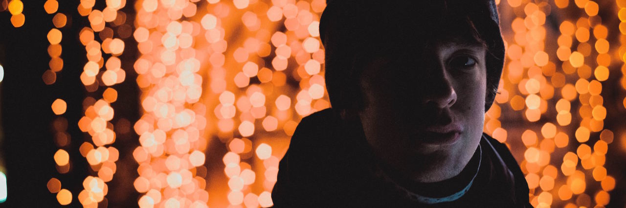 3 Things to Remember When You're Having a Bad Mental Health Day man with lights behind him