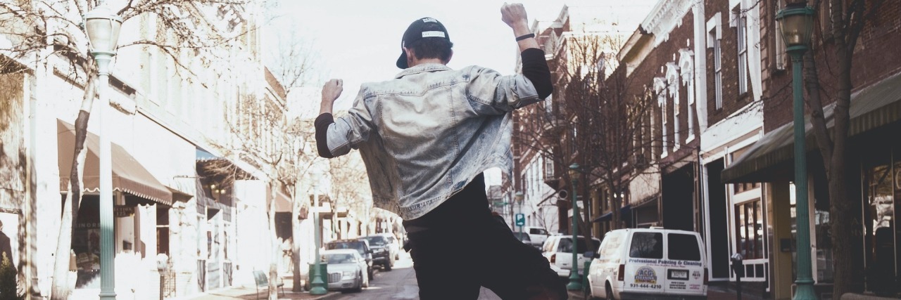 Recovering From an Injury With Cerebral Palsy Person dancing in the street.