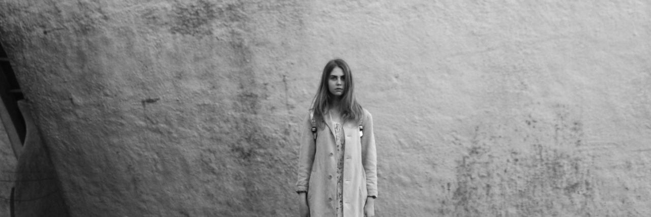 How People Responded to My 10-Year-Old Daughter's Suicide Attempt girl standing in front of boulder