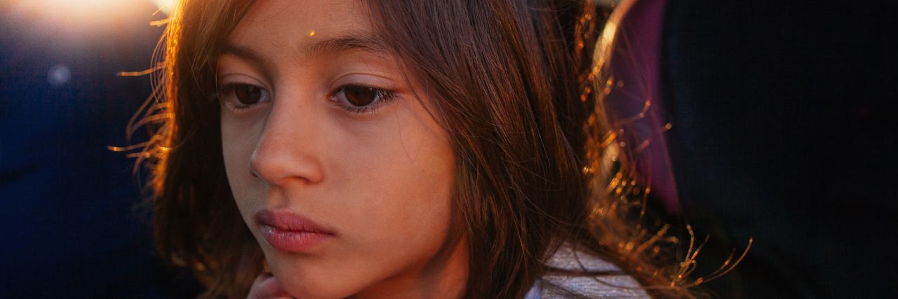 The Pain of Growing Up With Hidden Depression sad girl