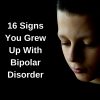 A young boy who looks sad. Text reads: 6 Signs You Grew Up With Bipolar Disorder
