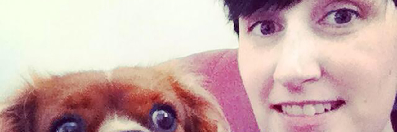 Returning to College With a Physical Disability Anne Marie with her dog.