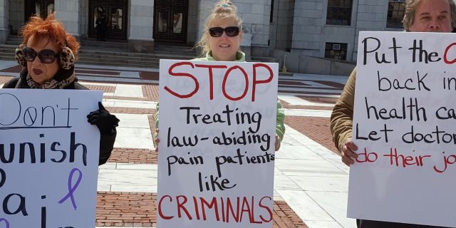 dont punish pain rally, sign says stop treating law abiding pain patients like criminals