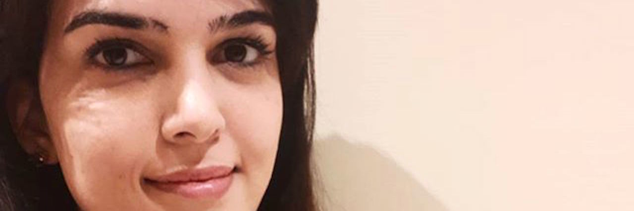 How Keeping an 'End of the Day Pictures' Journal Helps My Illness A selfie of the writer, smiling at her camera.