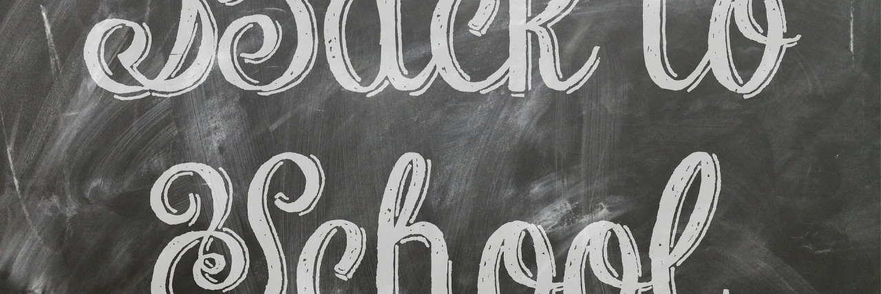 'back to school' written on a chalkboard