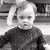 Black and white image of boy with Down syndrome