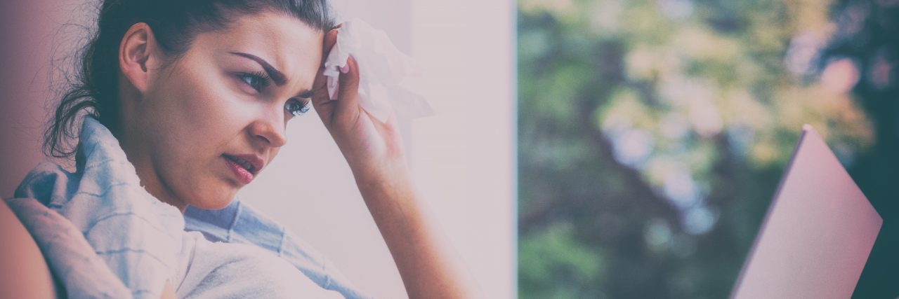 My 'Sick Days' Are Not for When I'm Sick Sick young woman working from home.