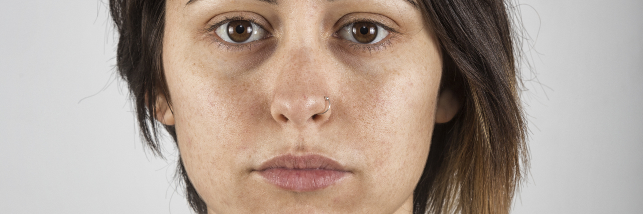 I Can't Find Affordable Counseling Near Me Studio portrait of a real adult european woman looking at camera with relaxed expression. The woman has around 40 years and has dark hair.
