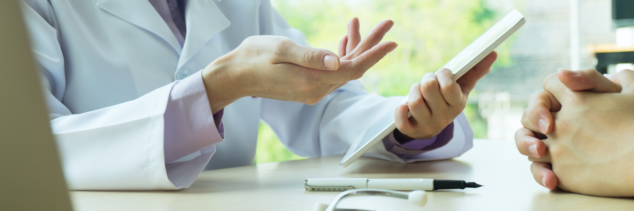 What My Doctor Should Have Told Me About Adrenal Insufficiency Doctor and patient are discussing something.