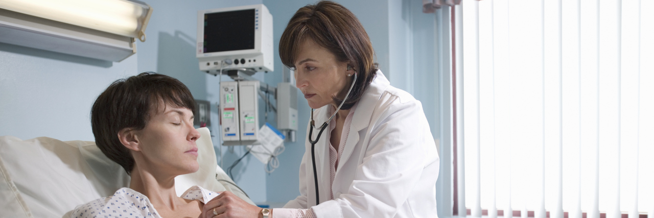 Why I Asked My ER Doctor, 'You're Actually Listening to Me?' A doctor listening to the heart of her patient.