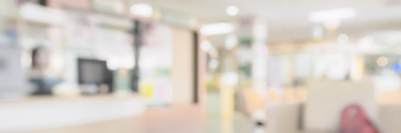 To the Nurse Who Validated Me After I Was Sexually Assaulted A blurred image of a hospital waiting area.