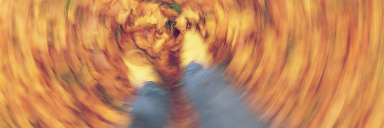 How I Finally Got My Orthostatic Intolerance Diagnosis A blurred image of a woman's feet.