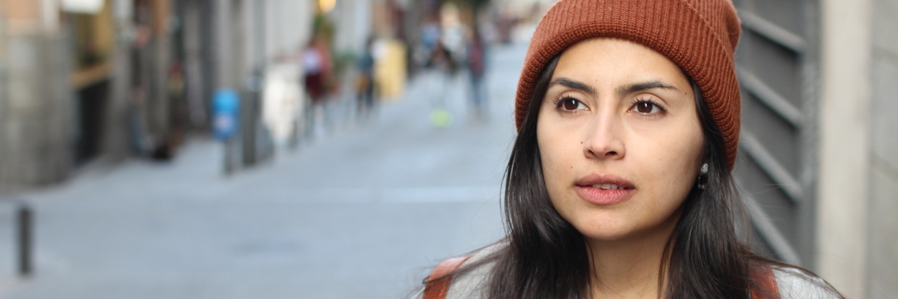 Could Exposure Therapy Help My OCD? Cosmopolitan woman outdoor close up