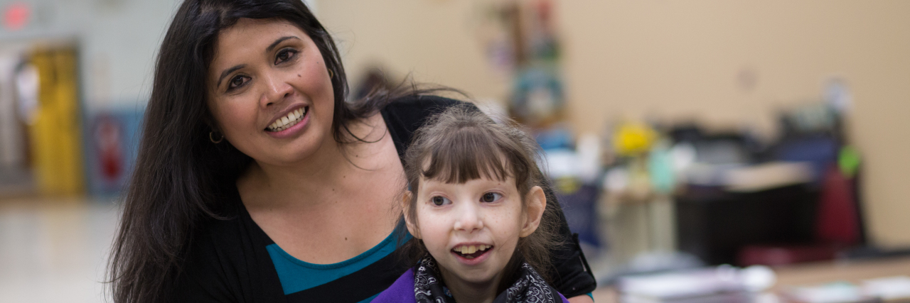 Finding My Life Path Working With People With Disabilities Maricela with a client.