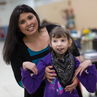 Maricela with a client.
