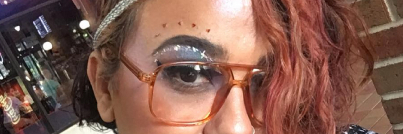 What It's Like Being the 'Fat Friend' a woman with the words "I'm the fat friend" over her selfie